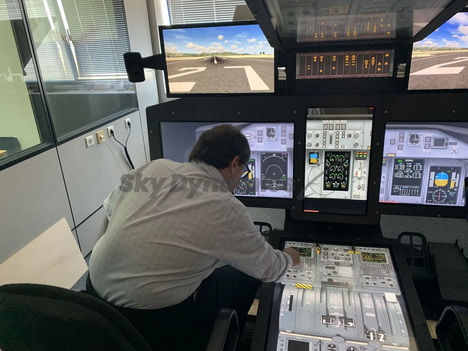 Bombardier Q400 simulator: pilot seat perspective
