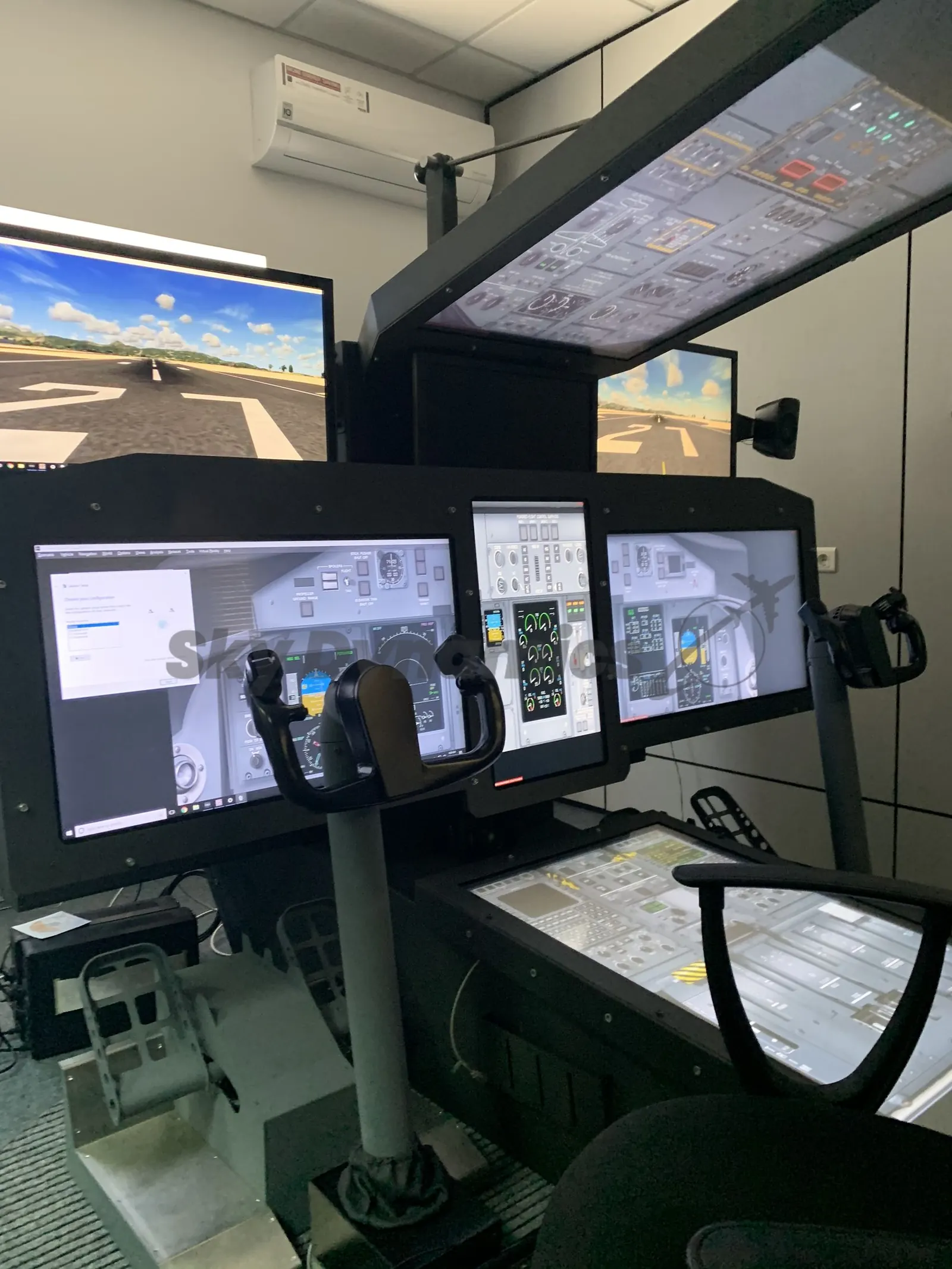 Bombardier Q400 simulator: full height cockpit view
