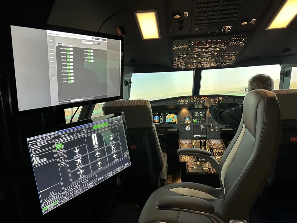 Instructor station screens of a SkyDynamics A320 simulator